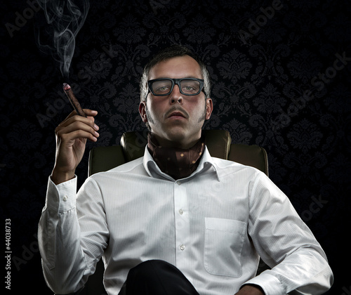 Photo: Funny portrait of rich man with serious face expression Funny portrait of rich man with serious face expression