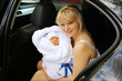 Photo: Mother with newborn in car Mother with newborn in car