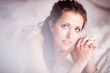 Photo: Stylish woman in a vintage dress in a luxurious interior Stylish woman in a vintage dress in a luxurious interior