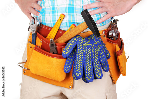 Foto: Tools on belt isolated on white Tools on belt isolated on white