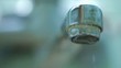 Water drips from the tap / Macro Slow motion