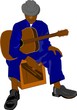 blues guitarist sitting on box