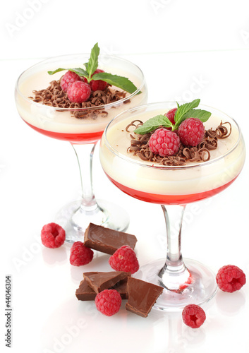 Photo: fruit jelly in glasses with chocolate and raspberries isolated fruit jelly in glasses with chocolate and raspberries isolated