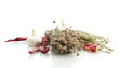 dried herbs in mortar and vegetables, isolatrd on white