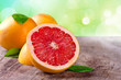 Freshly harvested grapefruit on wooden background