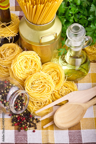 Photo: Italian pasta with olive, spices, cheese and parsley Italian pasta with olive, spices, cheese and parsley