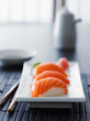 Photo: colorful salmon nigiri in asian setting colorful salmon nigiri in asian setting