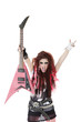 Portrait of young woman with sticking out tongue and holding electric guitar over white background
