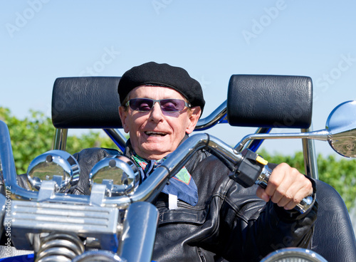 Photo: Happy Senior on Trike - Senior Trike Fahrer Happy Senior on Trike - Senior Trike Fahrer