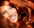 Beautiful Girl With Healthy Long Red Curly Hair