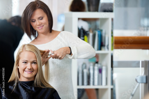 Photo: Woman Getting Haircut At Parlor Woman Getting Haircut At Parlor