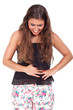 woman suffering from belly pain