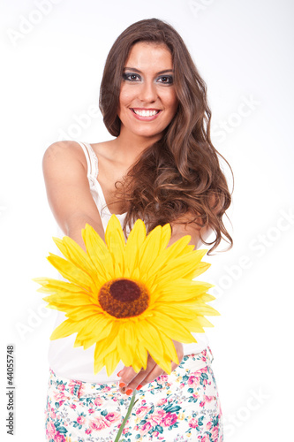 Photo: woman holding a sunflower woman holding a sunflower