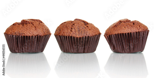 Photo: Fresh muffins isolated on white Fresh muffins isolated on white