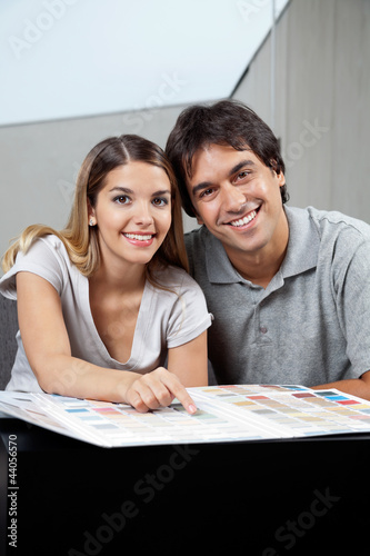 Photo: Couple With Color Swatch Chart Couple With Color Swatch Chart