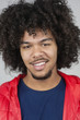 Portrait of happy young man with curly hair