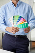 Interior Designer Holding Color Swatches