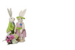 Rabbit couple with flower bouquet standing over white background
