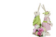Rabbit couple standing back to back with flower bouquet over white background