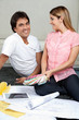 Couple With Blueprints And Color Swatches