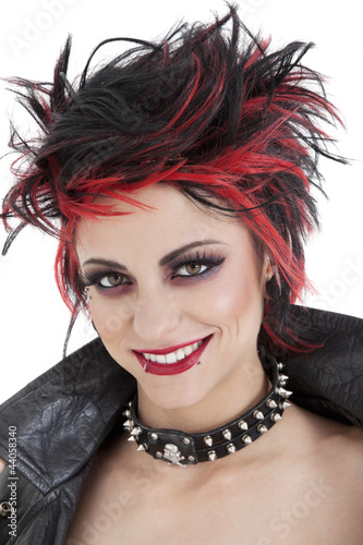 Photo: Portrait of beautiful young punk woman with spiked hair Portrait of beautiful young punk woman with spiked hair
