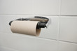 Close-up of finished toilet paper roll in bathroom
