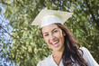 Photo: Happy Graduating Mixed Race Girl In Cap and Gown Happy Graduating Mixed Race Girl In Cap and Gown