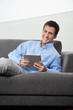 Photo: Happy Man Holding Digital Tablet Happy Man Holding Digital Tablet
