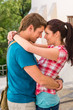 Photo: Young happy affectionate couple flirting outdoors Young happy affectionate couple flirting outdoors
