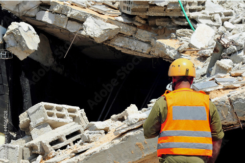 Photo: Search and Rescue Through Building Rubble after a Disaster Search and Rescue Through Building Rubble after a Disaster