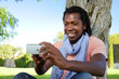 Black man using a smartphone.