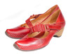 female leather red shoes isolated on white