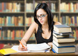 Foto: Attractive young brunette student girl. Attractive young brunette student girl.