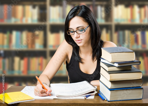 Photo: Attractive young brunette student girl. Attractive young brunette student girl.