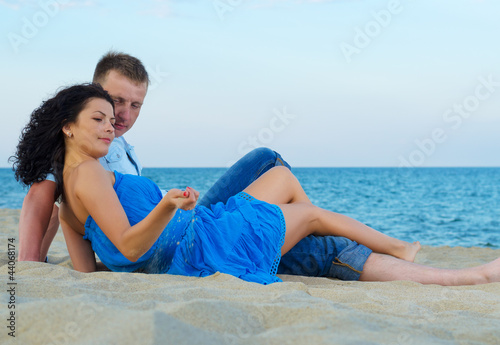 Photo: Happy couple by the sea Happy couple by the sea
