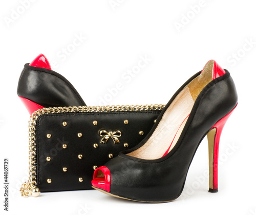 Photo: Sexy fashionable shoe and handbag isolated Sexy fashionable shoe and handbag isolated