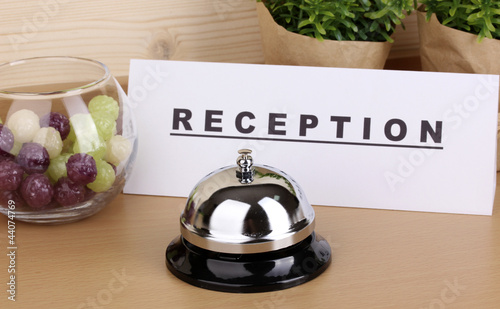 Photo: Hotel reception isolated on white Hotel reception isolated on white
