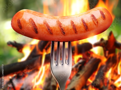Photo: Sausage on a fork. Sausage on a fork.