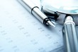 chart and a magnifying glass on the table,