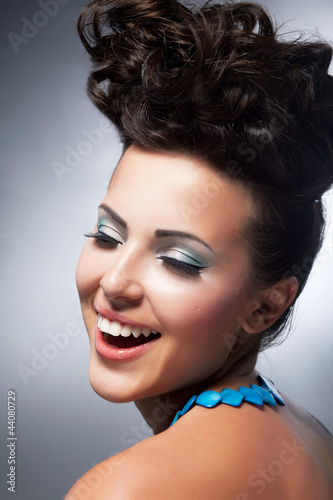 Photo: Delight. Elation. Beautiful young happy woman laughing with joy Delight. Elation. Beautiful young happy woman laughing with joy