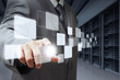 businessman pushing virtual buttons and server room background