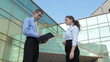 Video: Business partners making sale and agreement outdoor Business partners making sale and agreement outdoor