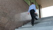 Video: Businessman with suitcase walking the stairs to work Businessman with suitcase walking the stairs to work
