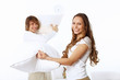 Young couple fighting with pillows