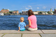 Family sitting on jetty