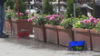Man sweeping in front of his restaurant