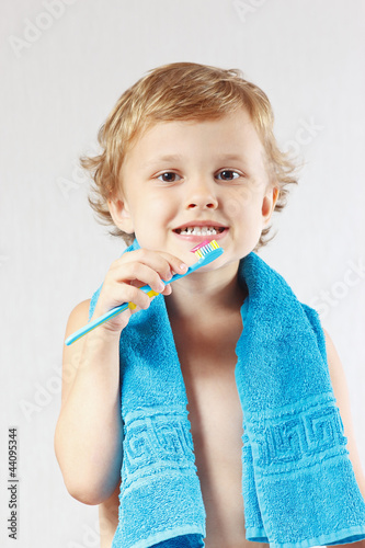Photo: Little boy with toothbrush with pink toothpaste Little boy with toothbrush with pink toothpaste