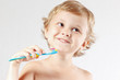 Young boy brushing his teeth