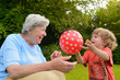 Photo: Granny Playing With Kid 1 Granny Playing With Kid 1