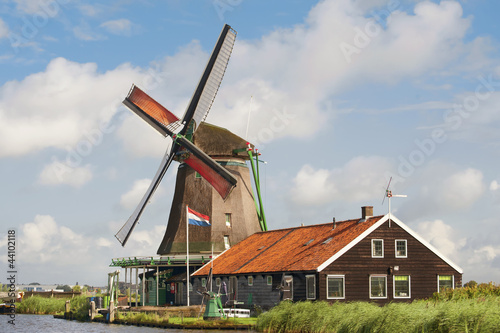 Photo: Beautiful windmill at De Zaanse Schans in the Netherlands Beautiful windmill at De Zaanse Schans in the Netherlands